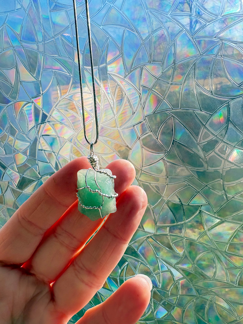 sea green crystal necklace wrapped in detailed wire